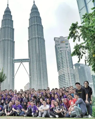 Team photo in front of the Petronas Twin Towers